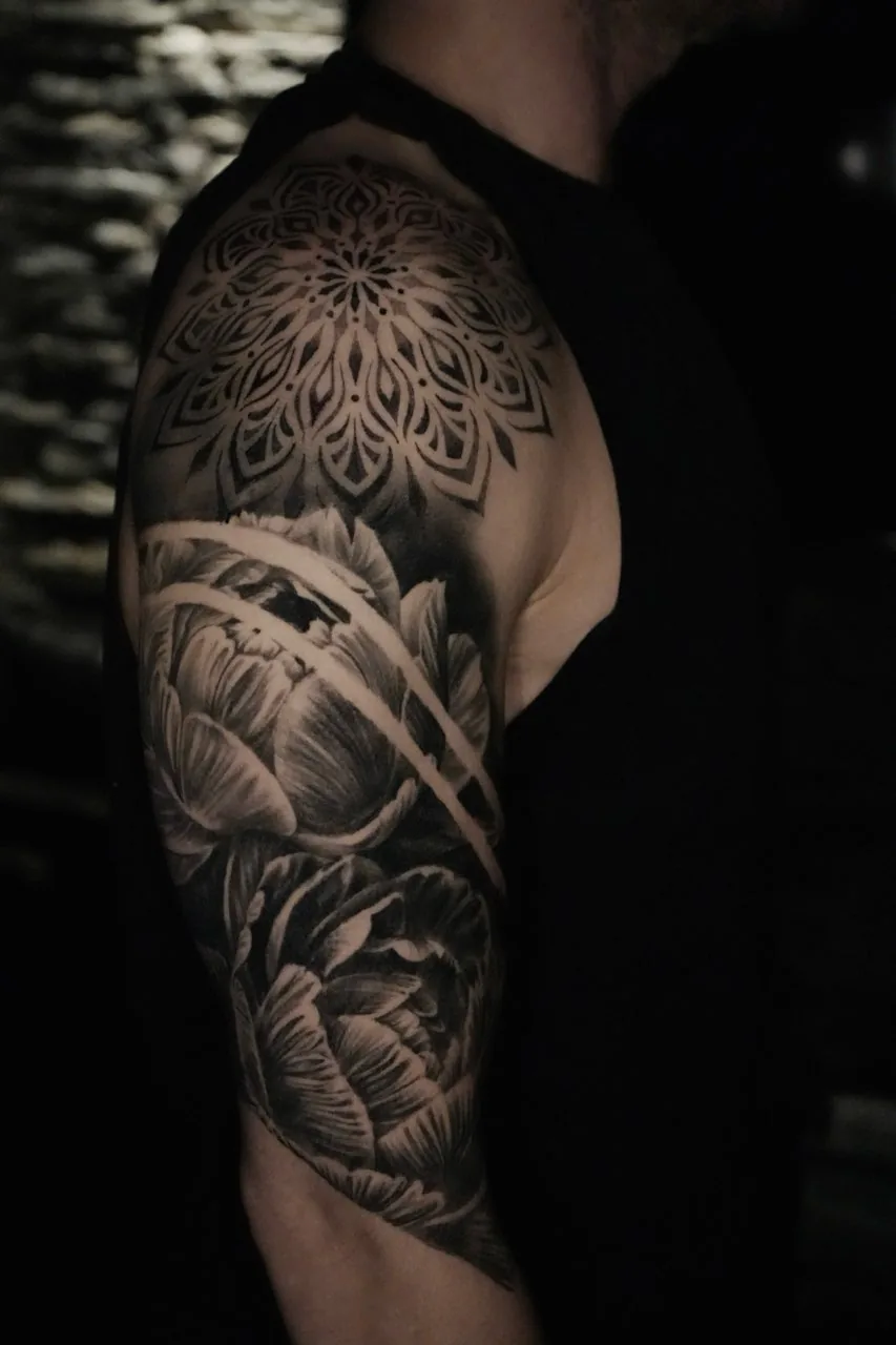 Mandala and peony black and grey arm tattoo by Courtnie Heller