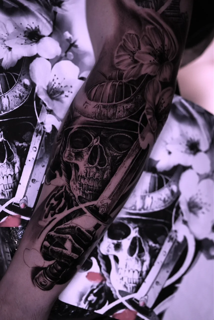 Black and grey samurai skull arm sleeve by Courtnie Heller
