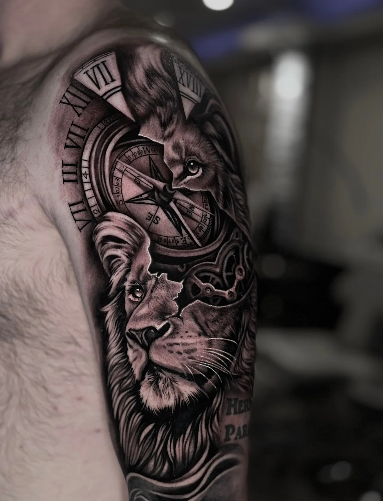 Black and grey lion, compass, and clock arm sleeve by Joel Ponce