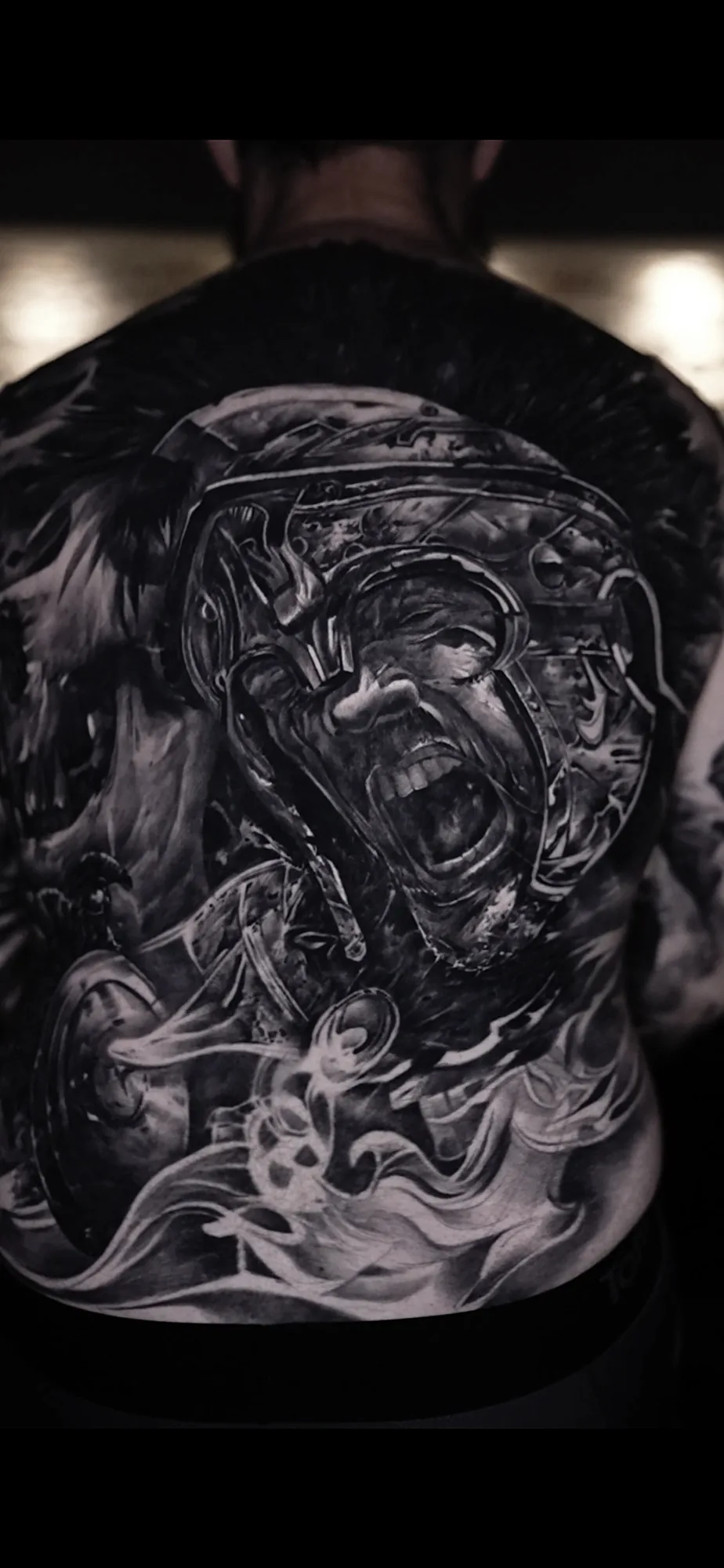 Black and grey Roman soldier back piece by JP Alfonso