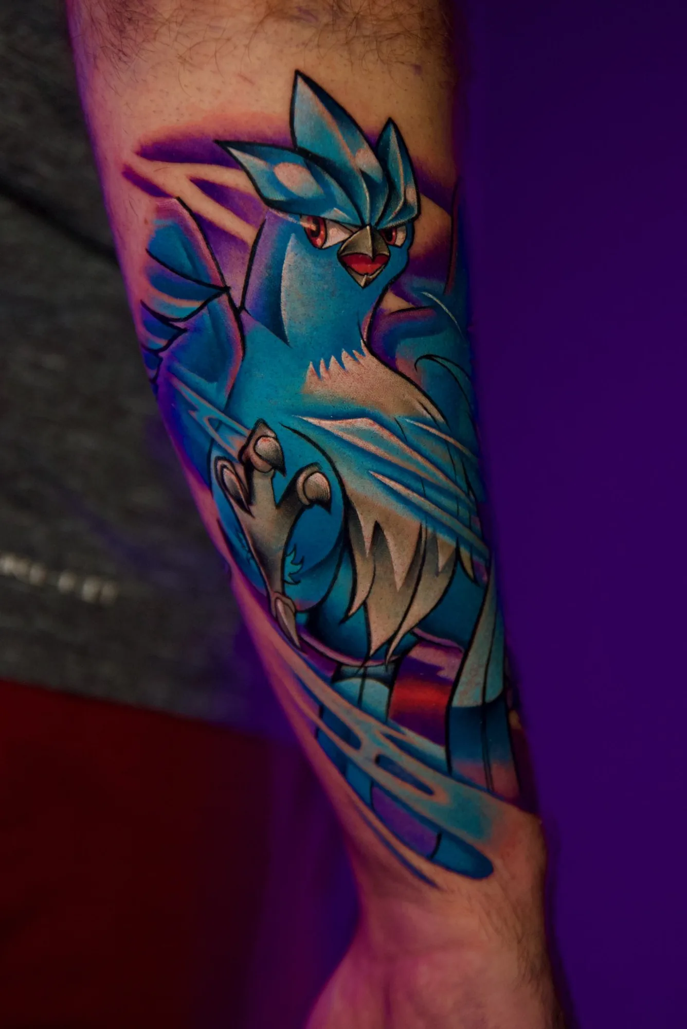 Color new school blue bird forearm tattoo by Nate Cummings