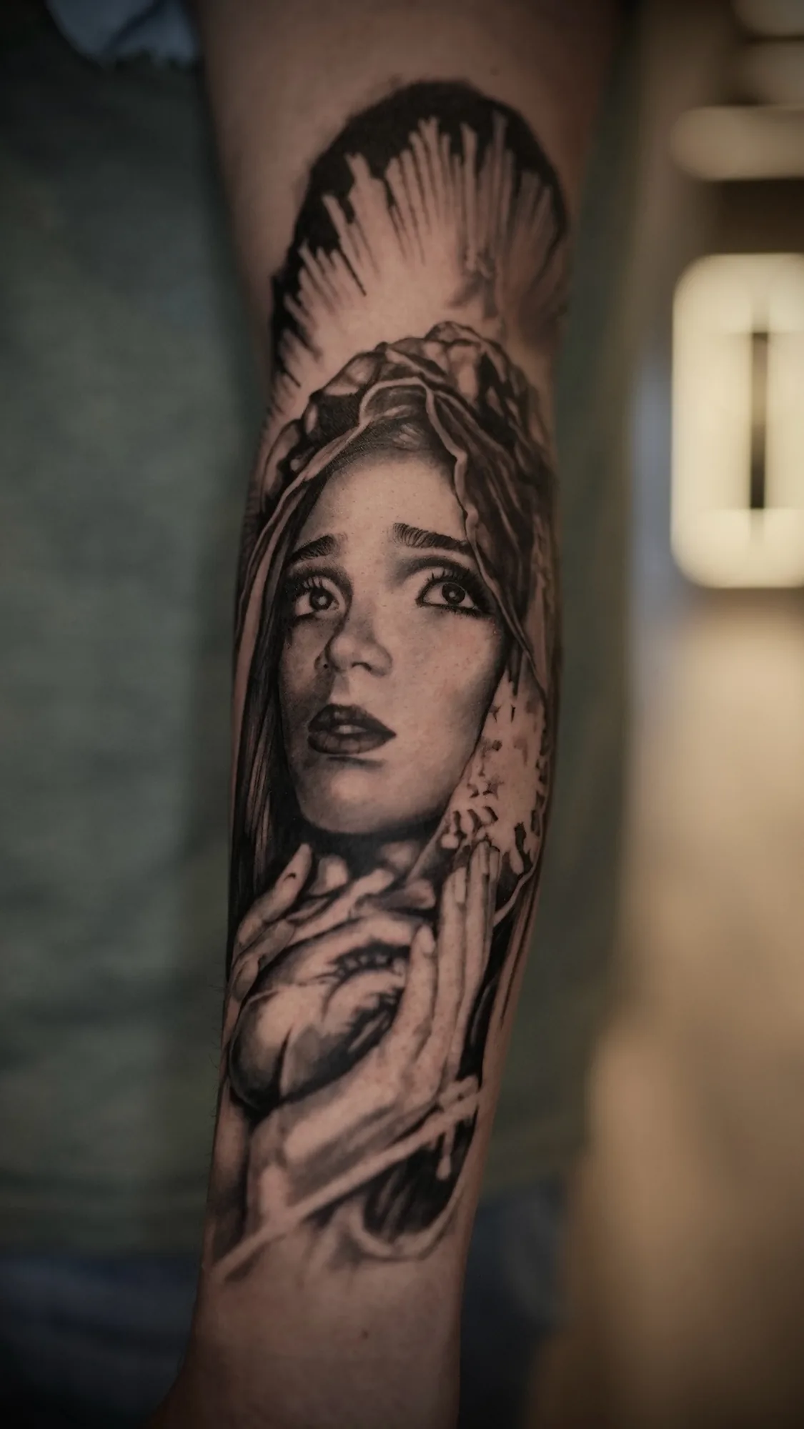Black and grey veiled woman portrait forearm tattoo by Zach Truitt