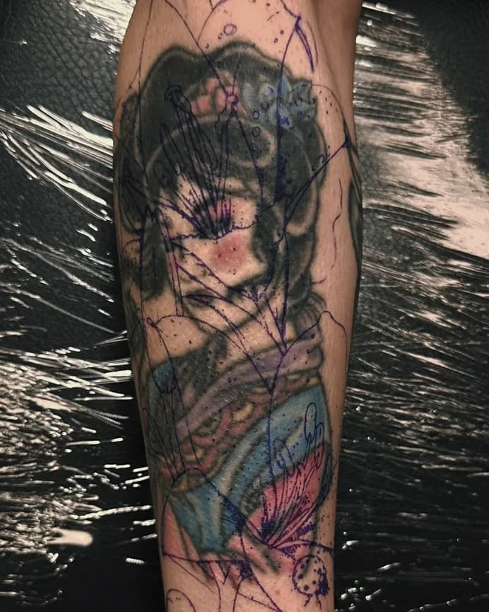 Faded color portrait tattoo before cover-up